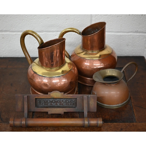 546 - A pair of copper and brass jugs, to/w seven Indian brass bowls and a stemmed bowl, a vintage brass l... 