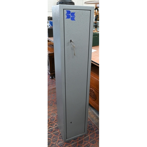 562 - A steel five-gun safe with two locks (keys in office)