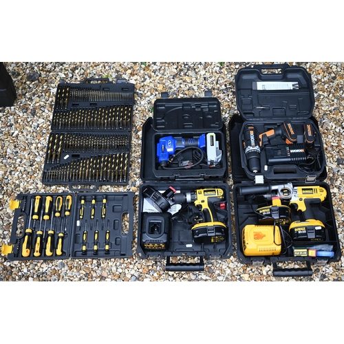 573 - A large quantity group of battery power tools - mostly unused - including two DeWalt drill/drivers B... 