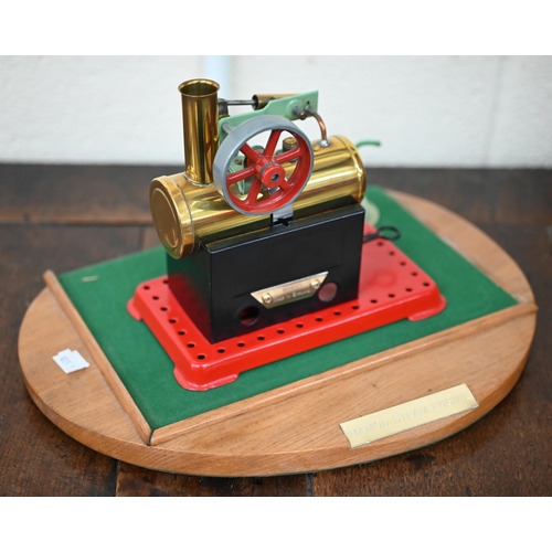 581 - A Mamod static steam engine in glass display-case