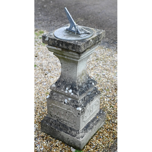 60 - A weathered cast stone obelisk sundial