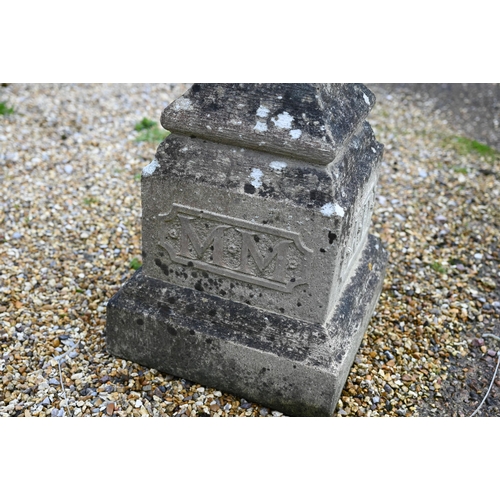 60 - A weathered cast stone obelisk sundial