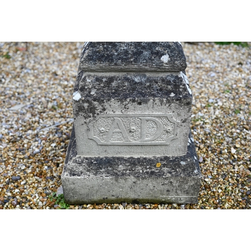 60 - A weathered cast stone obelisk sundial