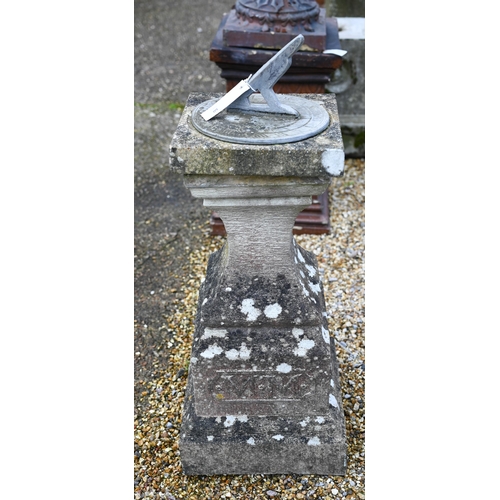 60 - A weathered cast stone obelisk sundial