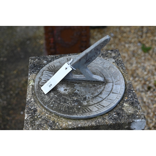 60 - A weathered cast stone obelisk sundial