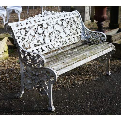 61 - A weathered and white painted Coalbrookdale style cast alloy garden bench