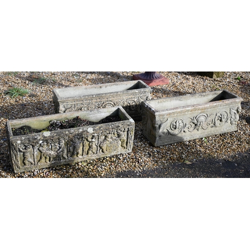 62 - A pair of weathered cast stone planter troughs to/w another (3)