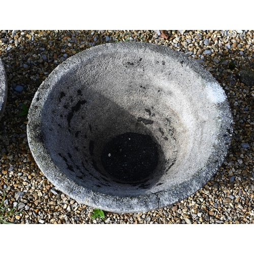 64 - A weathered cast stone column birdbath to/with a pair of conical form planters (3)