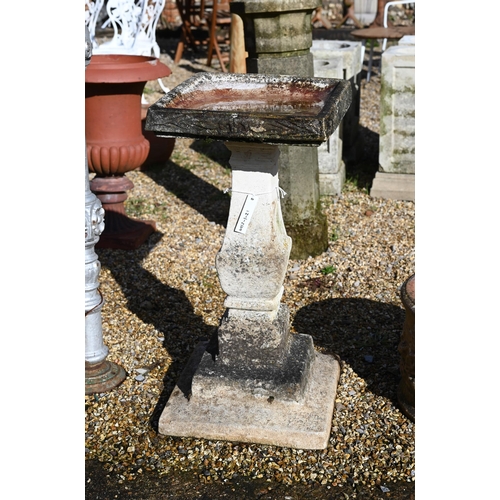 65 - A weathered cast stone bird bath