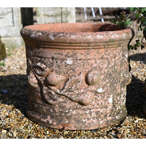 66 - Two weathered cast terracotta tub planters, one fruit design, one cherubs (2)