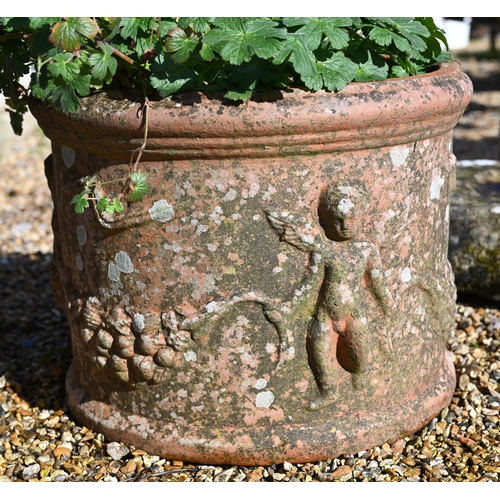 66 - Two weathered cast terracotta tub planters, one fruit design, one cherubs (2)