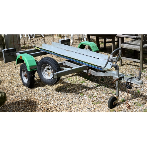 72 - A galvanised twin motorcycle trailer c/with spare wheels and light board - a/f