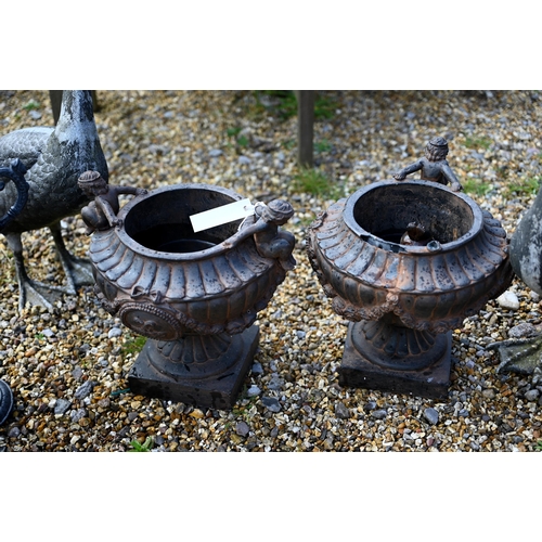 80 - A pair of cast alloy garden geese to/with a trio of composite garden planters, all a/f (5)