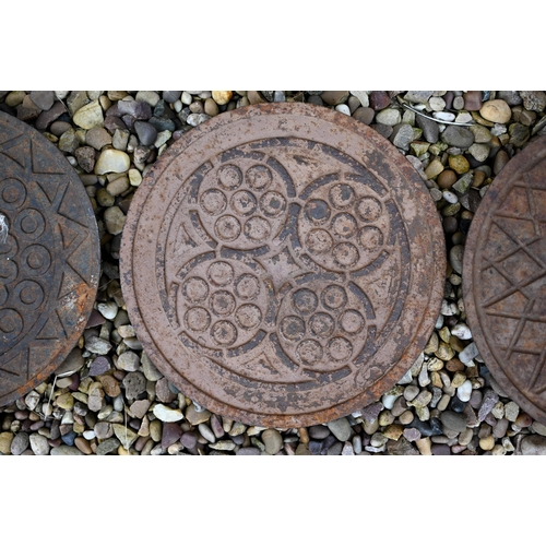 82 - A Victorian style cast iron and painted, circular cast iron ceiling rose to/with a trio of reclaimed... 