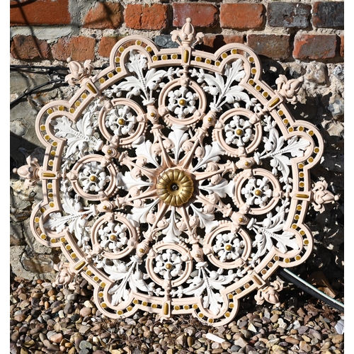 82 - A Victorian style cast iron and painted, circular cast iron ceiling rose to/with a trio of reclaimed... 