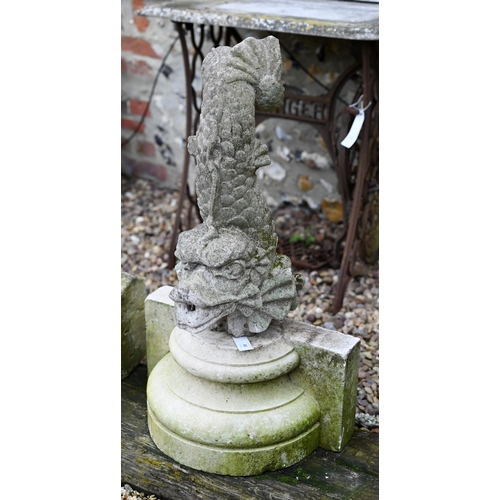 83 - Assorted antique and later carved stone architectural fragments to/with a cast sea monster garden sc... 