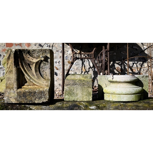 83 - Assorted antique and later carved stone architectural fragments to/with a cast sea monster garden sc... 