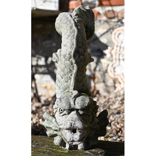 83 - Assorted antique and later carved stone architectural fragments to/with a cast sea monster garden sc... 