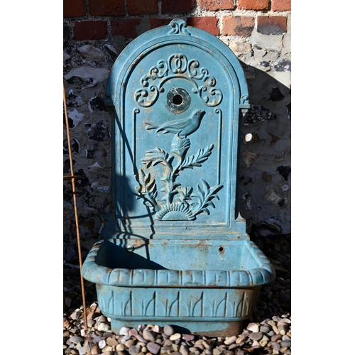 85 - A weathered old cast iron two piece garden wall mount fountain, with basin - no fittings and as remo... 