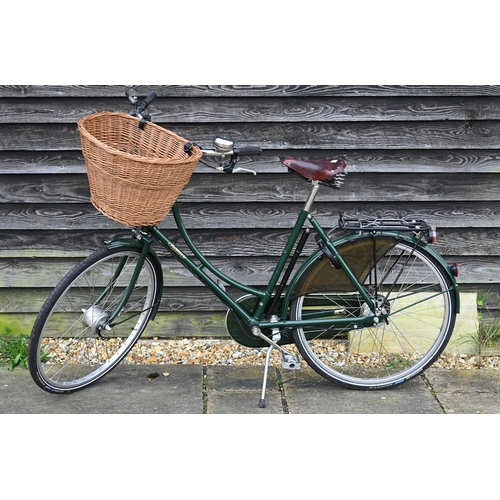 A Pashley Sovereign step-through bicycle c/with leather Brooks saddle, wicker basket and led lights (new price £900)