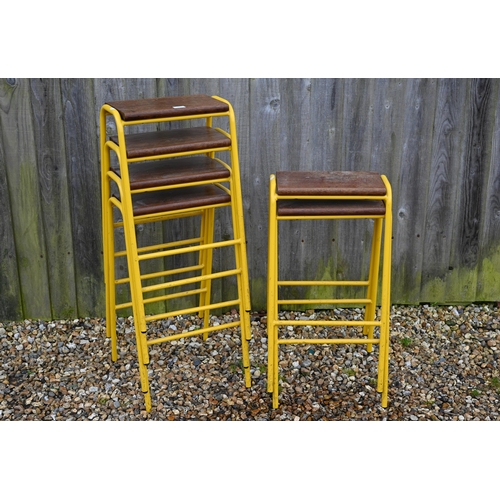 93 - A set of six yellow framed mid-height stacking lab stools, with hardwood seats (6)