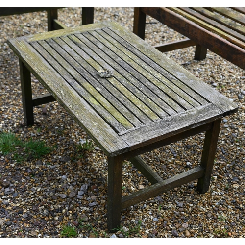 99 - A weathered teak garden bench to/with a pair of arm chairs and a coffee table (5)