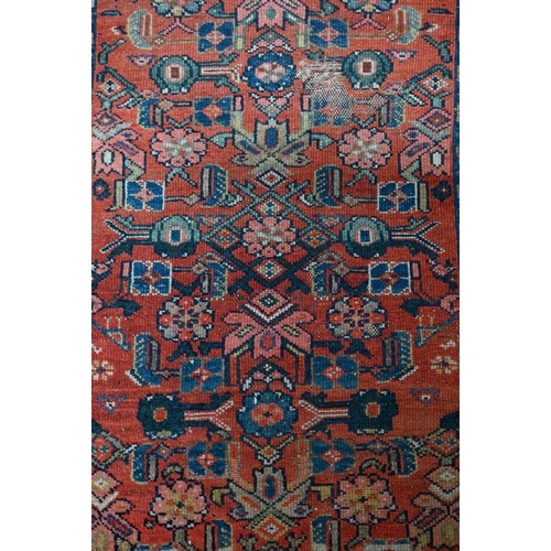 252 - A North West Persian Heriz prayer rug, floral herati design on red ground, 96 x 70 cm