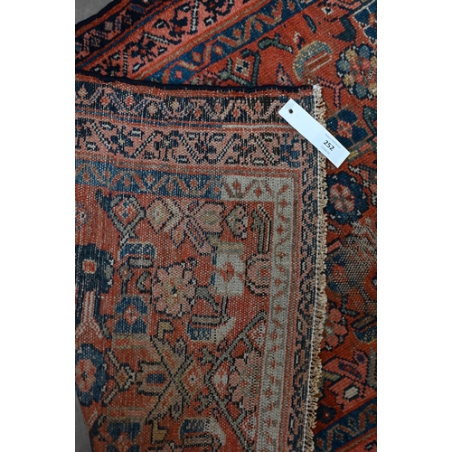 252 - A North West Persian Heriz prayer rug, floral herati design on red ground, 96 x 70 cm