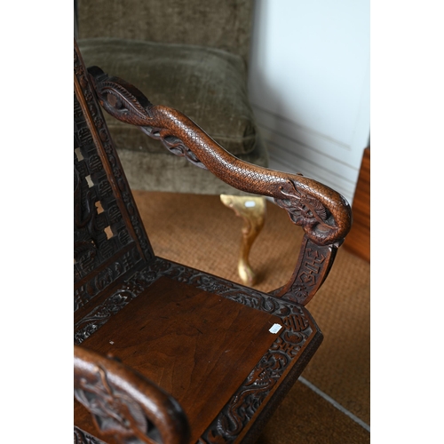 269 - An antique Chinese carved and moulded dragon back chair with hinged seat, a/f