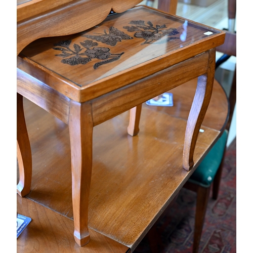 296 - A Chinese hardwood coffee table, the top with copper filigree inset dragon under glass, on shaped su... 