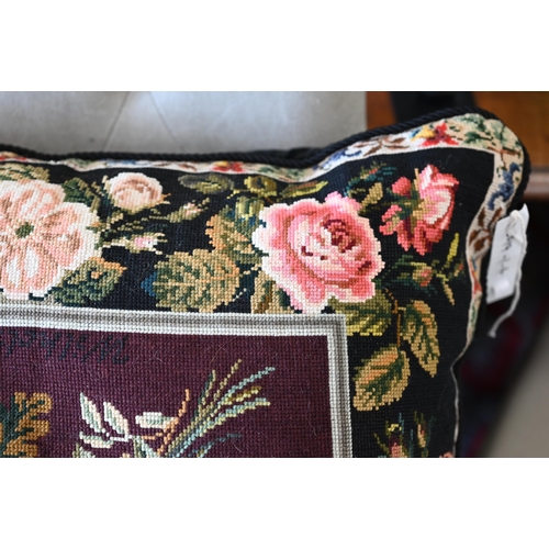 385 - A large floral tapestry square feather-filled cushion, velvet backed, 60 x 60 cm