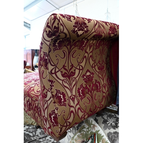 389 - A modern Multiyork scroll end chaise longue in burgundy and old gold floral fabric, 145 cm long x 70... 