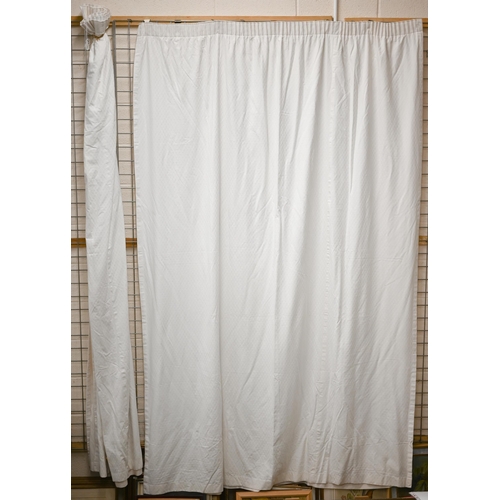 570 - A set of eight (four pairs) lined cream cotton curtains, each 267cm long by 100cm wide (at pleat), c... 