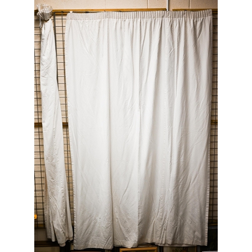 570 - A set of eight (four pairs) lined cream cotton curtains, each 267cm long by 100cm wide (at pleat), c... 