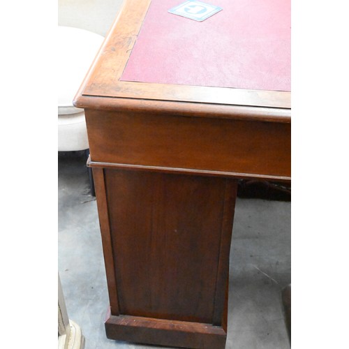 147 - A Victorian burr-walnut twin-pedestal desk with red leather top over nine drawers, 108 cm wide x 65 ... 