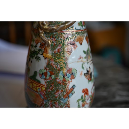 466 - A Cantonese porcelain famille rose-palette  vase, 25cm high, to/w two near-matched Japanese pottery ... 