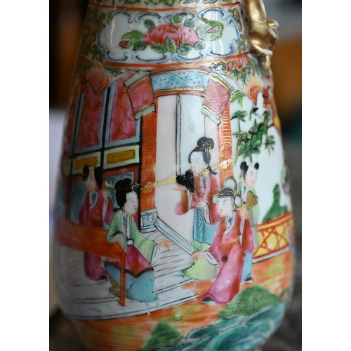 466 - A Cantonese porcelain famille rose-palette  vase, 25cm high, to/w two near-matched Japanese pottery ... 