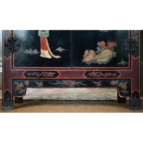 119 - A Japanese black lacquered and polychrome pictorial decorated cabinet, 62 cm x 31 cm x 92 cm h, lock... 