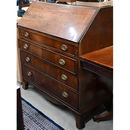 207 - A George III mahogany fall front bureau with four long graduating drawers and shaped bracket feet (a... 