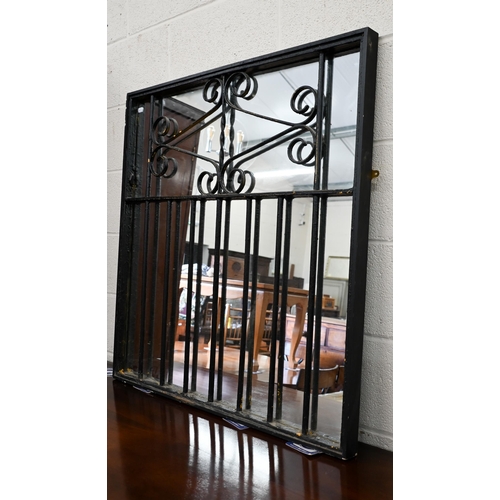 667 - A mirror-backed wrought iron garden gate, 90 x 94 cm high