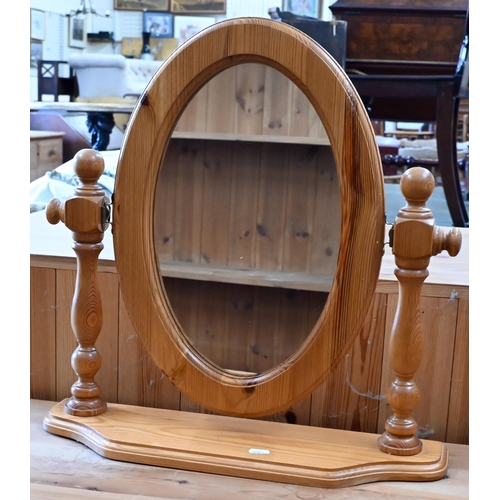 132 - A modern pine dressing table with three drawers c/w oval mirror and stool, 108 x 45 x 75 cm high