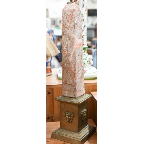 134 - A red-veined marble obelisk table lamp on gilt metal pedestal base 75 cm high to/w a giltwood mirror... 