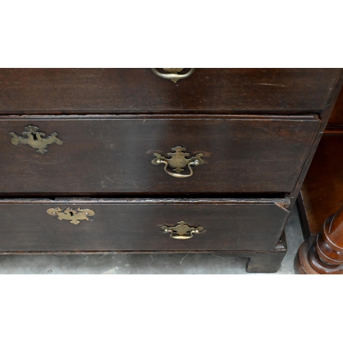 135 - A Georgian oak chest of two short over three long drawers on bracket feet, 98 x 53 x 104 cm high