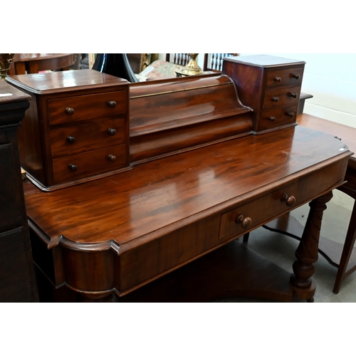 136 - #A Victorian mahogany dressing table on spiral fluted supports joined by concaved platform base, 120... 