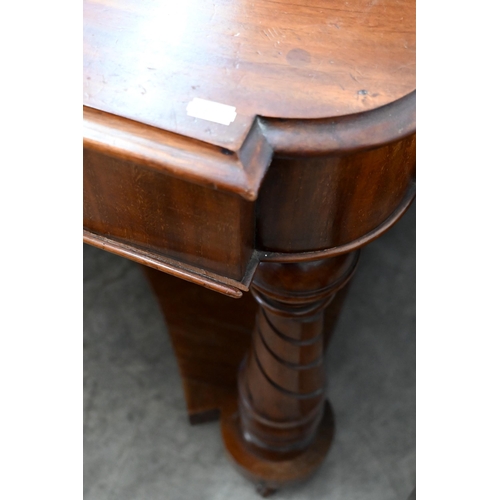 136 - #A Victorian mahogany dressing table on spiral fluted supports joined by concaved platform base, 120... 