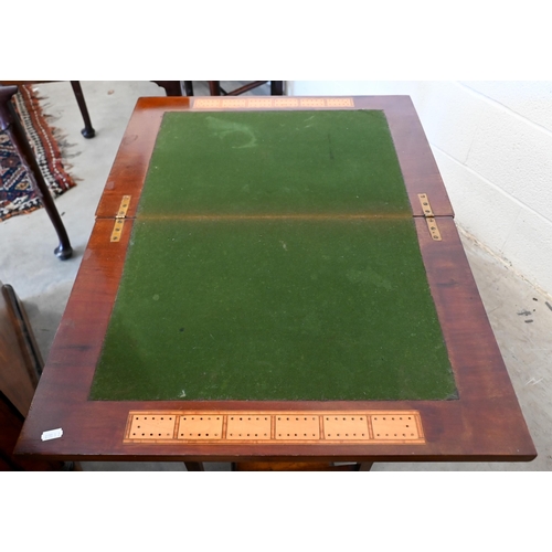 138 - An Edwardian walnut bridge/card table with rotating baize lined folding top and end drawer, 60 cm wi... 