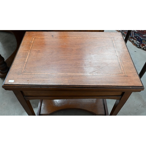 138 - An Edwardian walnut bridge/card table with rotating baize lined folding top and end drawer, 60 cm wi... 