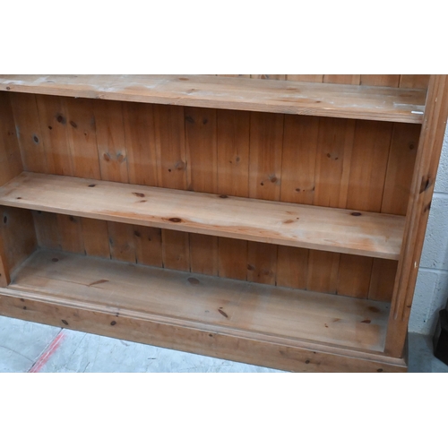 155 - A modern pine open bookcase with four adjustable shelves, 122 x 25 x 182 cm high