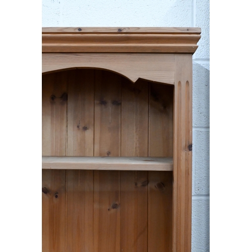 155 - A modern pine open bookcase with four adjustable shelves, 122 x 25 x 182 cm high