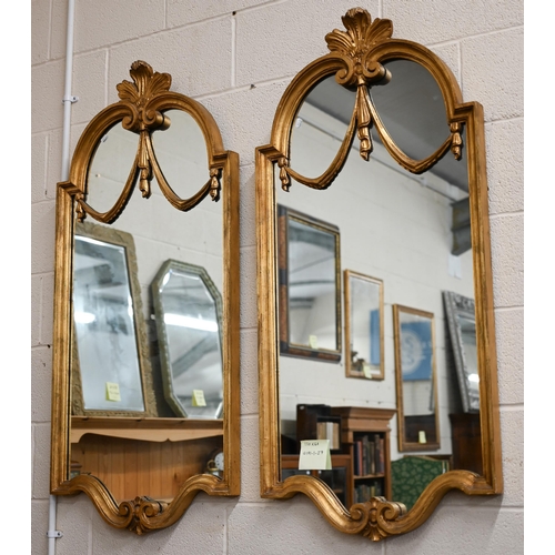 159 - A pair of large wall mirrors with decorative carved and moulded giltwood frames, 130 x 61 cm